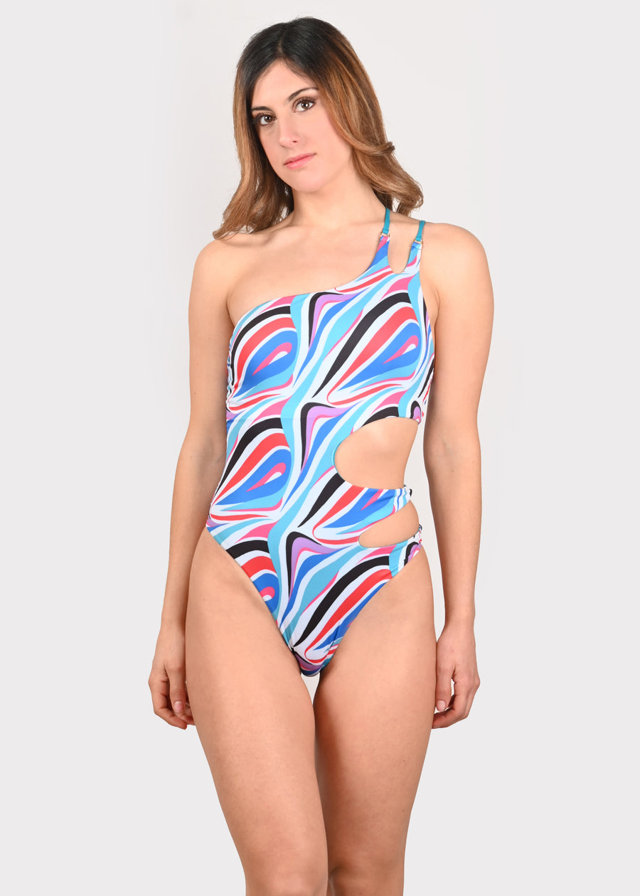 Costume intero monospalla in microfibra ottanio e stampa Millyblu "Onda". Sensuale e femminile, il costume intero cut out è composto da tagli e aperture laterali, anellini oro e doppia bretellina. I tessuti elastici permettono una maggiore resistenza. Donano comfort a chi li indossa e si asciugano rapidamente.