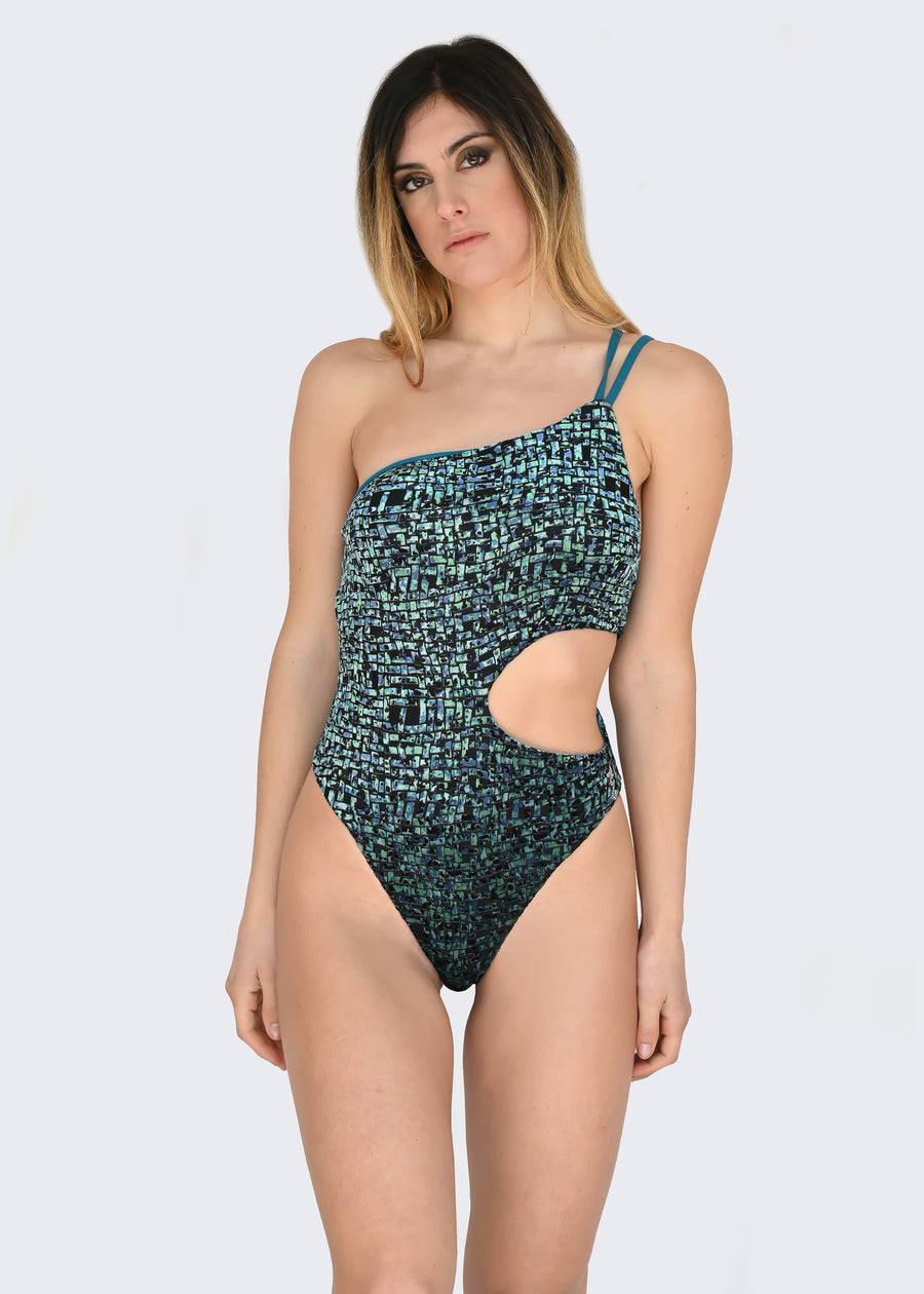 Costume monospalla in microfibra ottanio e velluto verde. Il costume intero sgambato ha le coppe estraibili e doppia bretellina. I tessuti elastici sono confortevoli, permettendo una rapida asciugatura. Ideale come costume da bagno mare, piscina o body per gli outfit estivi. I costumi interi monospalla sono un must have.