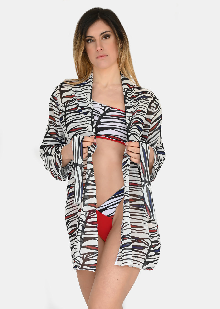 Cardigan in georgette "Zebra Rossa", riporta uno dei tanti dipinti di Millyblu. Ha la manica larga e la cinta in vita. Confortevole, fresco e morbido. Comodo per le lunghe giornate estive anche come copricostume mare o fuori acqua.
